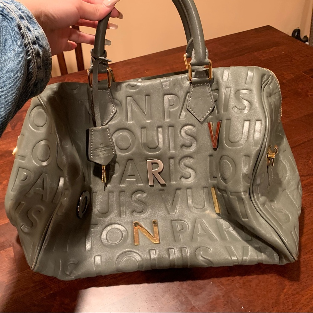 LOUIS VUITTON Limited Edition Black Embossed Leather Speedy Cube Bag